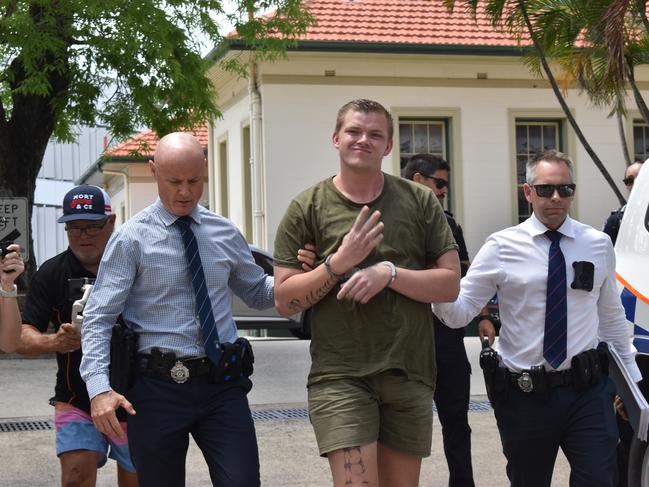 James George De Marco being walked to the Rockhampton Watch House on January 17 2024. He has been charged with the alleged murder of Anuisha Bone.