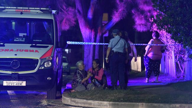 Emergency services at Mr Tokcan’s. Dharruk home where he was allegedly murdered in March 2018. Picture: Gordon McComiskie