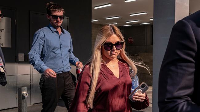 Ellie Smith (C) and Jake Gliddon (L) outside the WA District Court on Wednesday following the sentencing of Terence Kelly, their daughter Cleo’s kidnapper. Picture: NCA NewsWire/ Tony McDonough