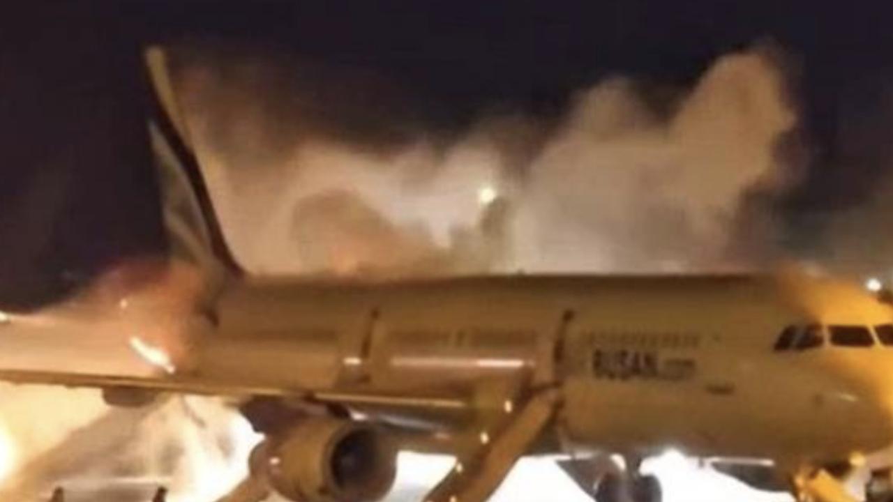 Terrifying moment fire erupts on plane before takeoff