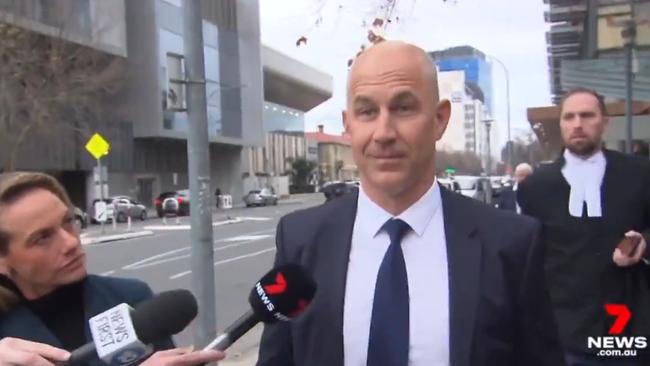 Channel 7 cameras followed Warren Tredrea from court. Photo: Twitter, @7NewsAdelaide.