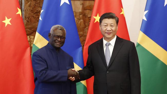 Chinese President Xi Jinping (R) shakes hands with Prime Minister Manasseh Damukana Sogavare of the Solomon Islands. Picture: Sheng Jiapeng/China News Service/VCG via Getty Images