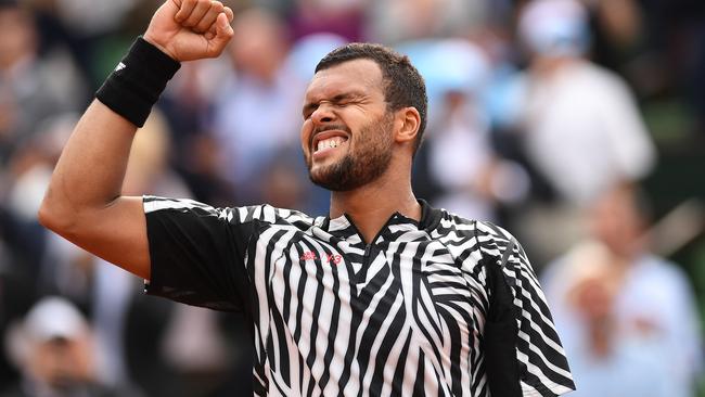 Jo-Wilfried Tsonga of France celebrates victory during the Men's Singles second round match against Marcos Baghdatis of Cyprus.