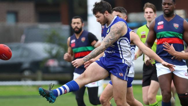 EDFL: Ricky McGill gets a kick for Coburg Districts. Picture: Hamish Blair