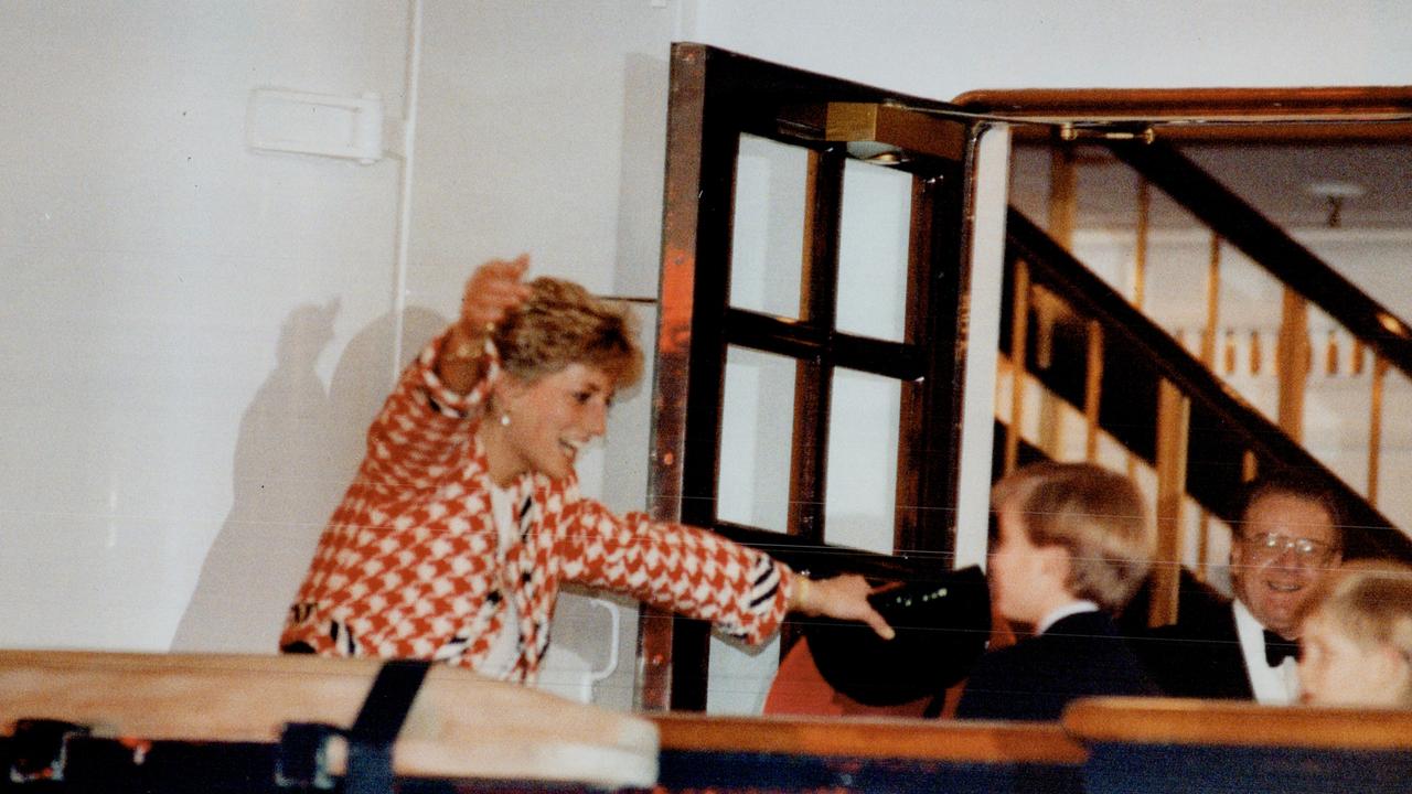 Diana, Princess of Wales; runs to hug Harry and William. Picture: Colin McConnell/Toronto Star via Getty Images.