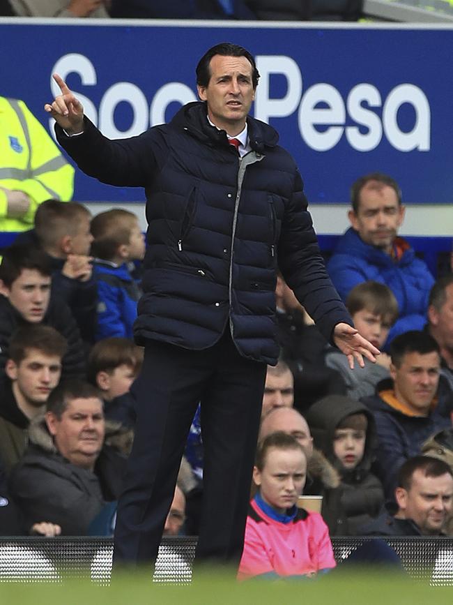 Arsenal manager Unai Emery gestures on the touchline during their English Premier League soccer match against Everton at Goodison Park, Liverpool, England, Sunday, April 7, 2019. (Peter Byrne/PA via AP)