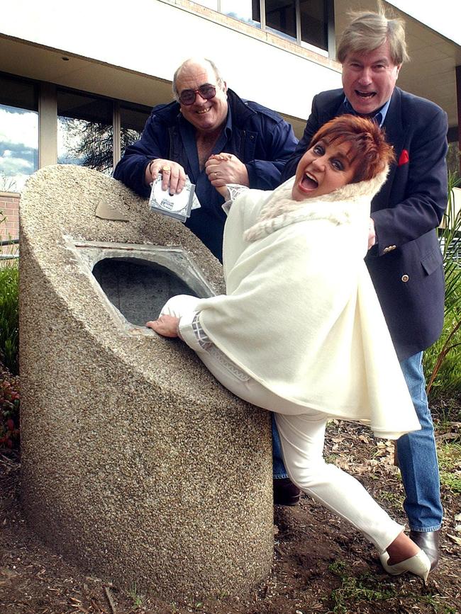 2004: Radio broadcasters Jeff Sunderland and Jeremy Cordeaux putting Anne Wills into the 5DN time capsule, which was opened that day after 20 years.