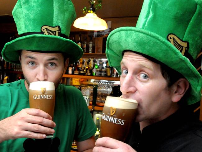 Irish MP212060  Gerry Murphy (L) and Tim Hartnett gear up for St Patricks Day at Harrigan's Irish Pub in Calypso Bay.