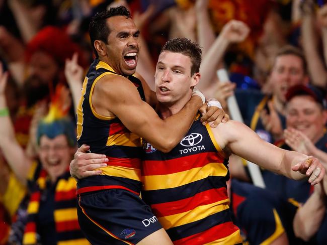 ADELAIDE, AUSTRALIA - SEPTEMBER 22: Josh Jenkins of the Crows (right) celebrates a goal with Eddie Betts of the Crows during the 2017 AFL First Preliminary Final match between the Adelaide Crows and the Geelong Cats at Adelaide Oval on September 22, 2017 in Adelaide, Australia. (Photo by Adam Trafford/AFL Media/Getty Images)