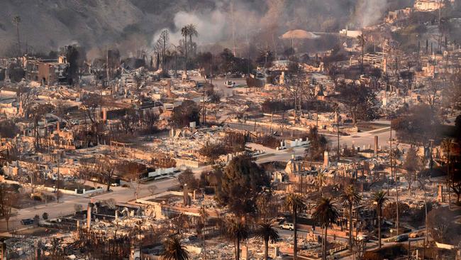 In this aerial view taken from a helicopter, homes burned from the Palisade fire are shown. Picture: AFP