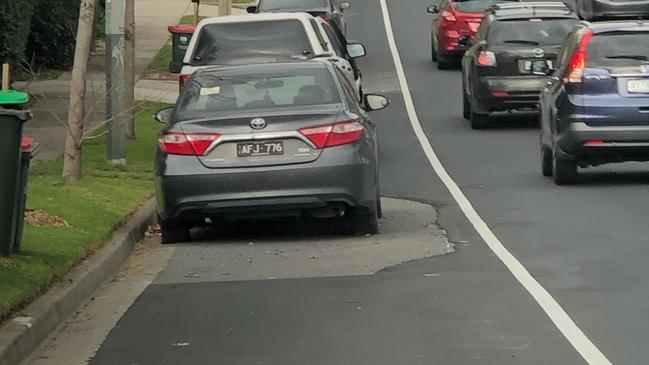 A parked car didn’t stop the roadworks being done on Blackburn Rd.