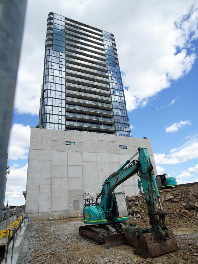 Photo of Bensons Property Group project Liberty 1 building in Footscray with diggers in the front where Liberty 2 was to be built. Picture: NewsWire / Luis Enrique Ascui