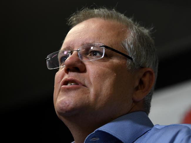 Prime Minister Scott Morrison speaks to the media after touring the NSW Rural Fire Service control room in Sydney, Sunday, December 22, 2019. Mr Morrison arrived back in Sydney on Saturday after cutting a family holiday in Hawaii short amid the bushfire emergency in NSW. (AAP Image/Joel Carrett) NO ARCHIVING