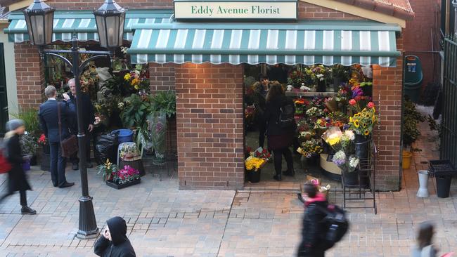 Owner of the Eddy Avenue Florist Manuel Theoharis reopens his central station shop after police shot an attacker in his shop. Picture: John Grainger