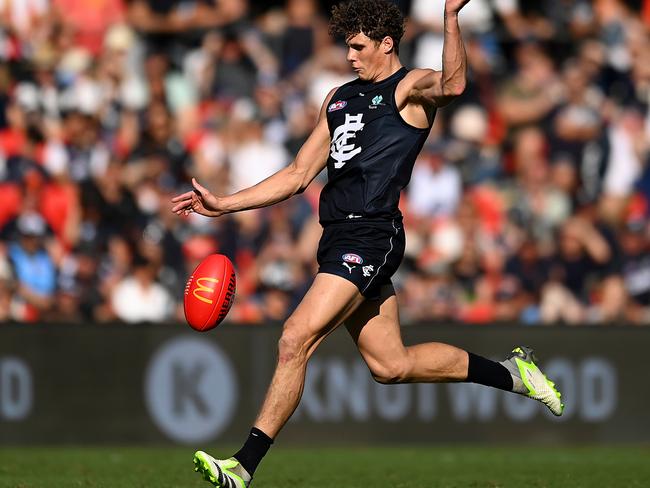 Charlie Curnow kicks one of his five goals against Gold Coast. Picture: Albert Perez/AFL Photos via Getty Images