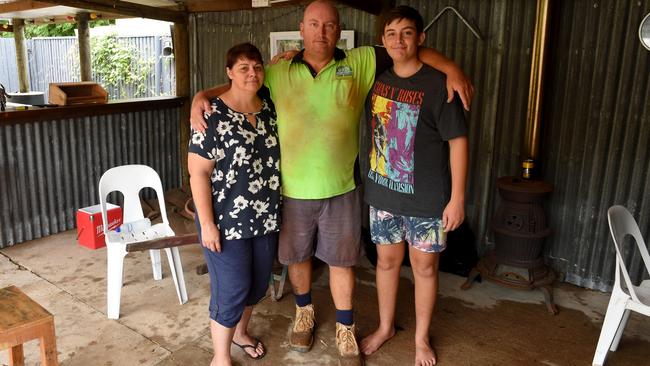 Kim Love with husband Gavin, who was stuck in Charters by floods, and son Cameron, 16. Picture: Evan Morgan