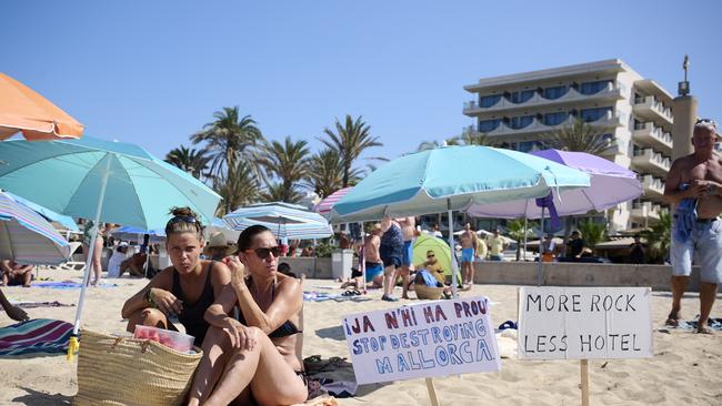 Members of the Mallorca Platja Tour association protest against tourist saturation on the beach of Palma de Mallorca. Picture: Carlos Alvarez/Getty Images