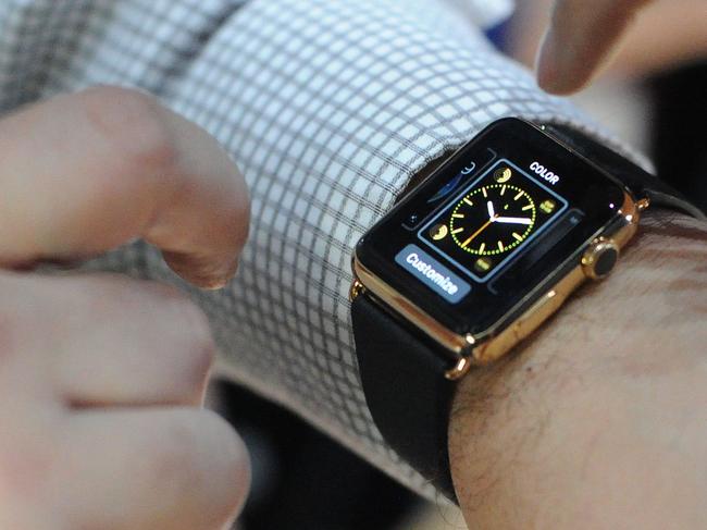 (FILES) This March 9, 2015 file shows an Apple employee demonstrating how to use an Apple Watch during an Apple media event at the Yerba Buena Center for the Arts in San Francisco, California. The Apple Watch is fueling the emerging smartwatch market and is expected to be the top seller in the segment for next few years, a market research report showed May 6, 2015. The IHS Technology report said the smartwatch market will grow to 101 million units by 2020 from just 3.6 million last year. AFP PHOTO / JOSH EDELSON