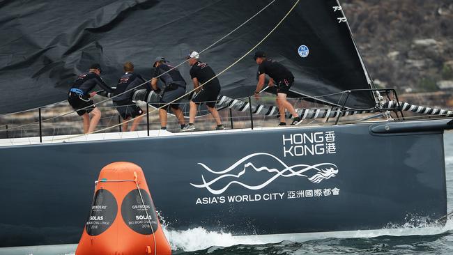 Crew aboard Scallywag change a sail during the Solas Big Boat Challenge. (Brett Costello)