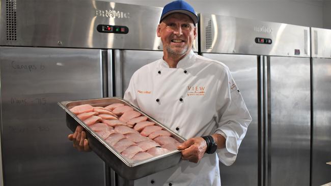 Matt Golinski with a tray of fresh mackerel from Rosslyn Bay Seafoods for the degustation dinner as part of Capricorn Food and Wine Festival.