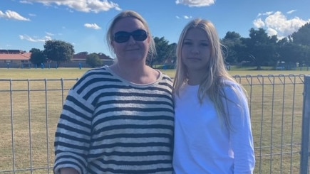 Kellie Hilder and her daughter Chloe say Tuesday's shark attack at Tuncurry Beach had been a long time coming. Picture: Dan Mills.