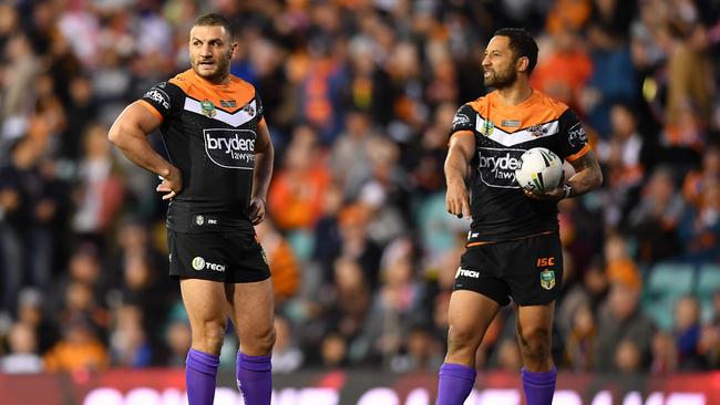 Robbie Farah (left) and Benji Marshall of the Tigers during the Round 23 NRL match between Wests Tigers and the St George-Illawarra Dragons at Leichhardt Oval in Sydney, Saturday, August 18, 2018. (AAP Image/Joel Carrett) NO ARCHIVING, EDITORIAL USE ONLY