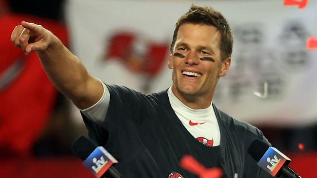 FILE - JANUARY 22, 2022: It was reported that NFL quarterback Tom Brady of the Tampa Bay Buccaneers is retiring from football after 22 seasons and seven Super Bowl titles January 29, 2022. TAMPA, FLORIDA - FEBRUARY 07: Tom Brady #12 of the Tampa Bay Buccaneers celebrates after defeating the Kansas City Chiefs in Super Bowl LV at Raymond James Stadium on February 07, 2021 in Tampa, Florida. The Buccaneers defeated the Chiefs 31-9. (Photo by Mike Ehrmann/Getty Images)