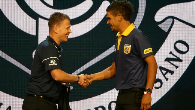 Brendon Bolton welcomes Sam Petrevski-Seton to Carlton. Picture: Jonathan Ng