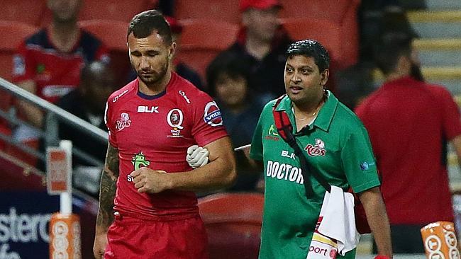 Quade Cooper injured his shoulder in the Reds’ loss to the Rebels.