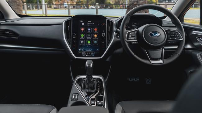 The Impreza dash is dominated by a vertical, iPad-style touchscreen.