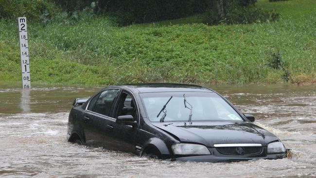 Flash flooding on Hardys Rd at Mudgeeraba. Picture Glenn Hampson.