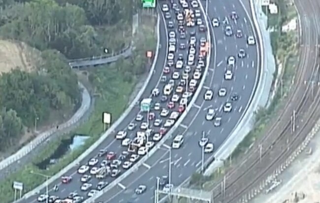 Traffic chaos on the Pacific Motorway following a four-car prang