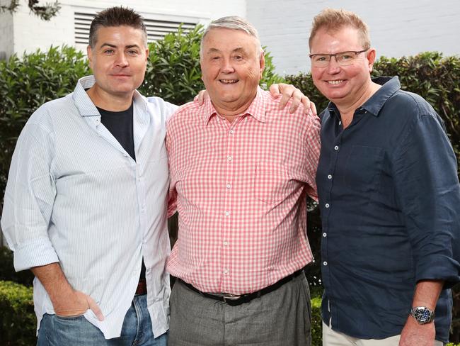 Stu Laundy (left) and brother Craig Laundy (right) with patriarch Arthur Laundy at his recent birthday celebrations. Picture: Richard Dobson