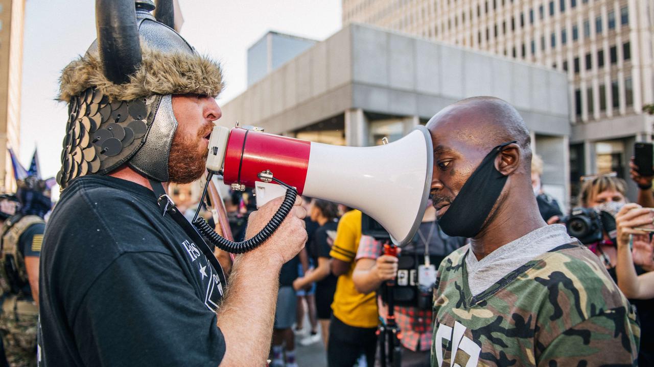 Demonstrators argue in front of the Louisville Metro Hall on September 5, 2020 in Louisville, Kentucky. Picture: Brandon Bell