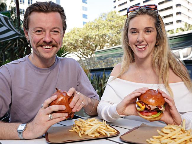 OCTOBER 9, 2023. (LR) Dan Nicholas and Georgia Bounds at Greenwood Hotel which has been nominated for the Australian Hotel Association Best Burger competition. Picture: Adam Yip
