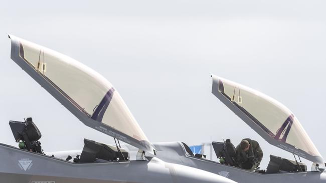 Two Royal Australian Air Force F-35 aircraft sit on the tarmac at Avalon airport. A unit of the aircraft has been grounded in the US after experiencing oxygen supply issues. Picture: AFP/Jeremy R Dixon