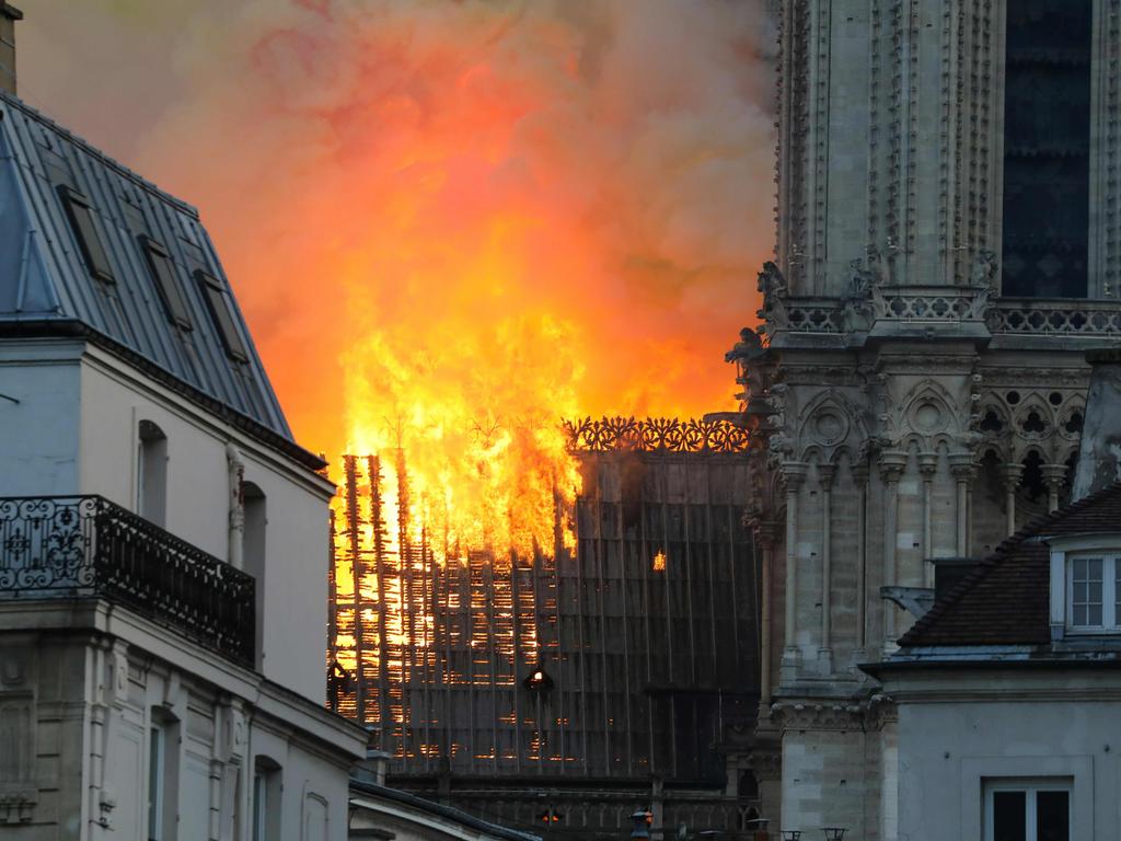 Flames seen roaring through the cathedral. Picture: AFP