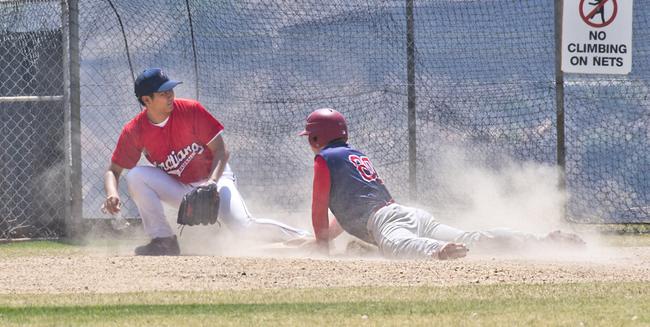 Isaac Neill, Rangers safe at third base.