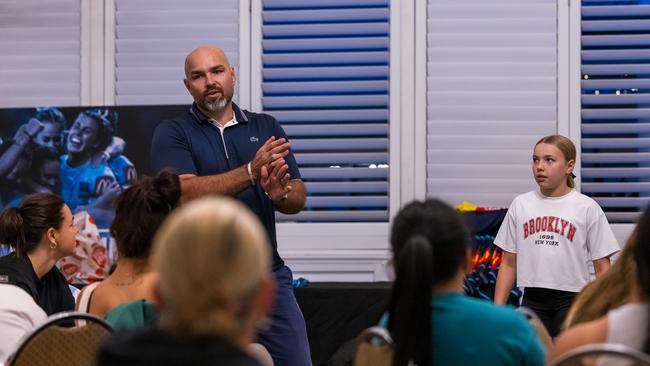 North Queensland coach Todd Payten speaks to the NSW Blues women's Origin team as his daughter Indiana, 10, watches on. (Supplied by NSWRL)