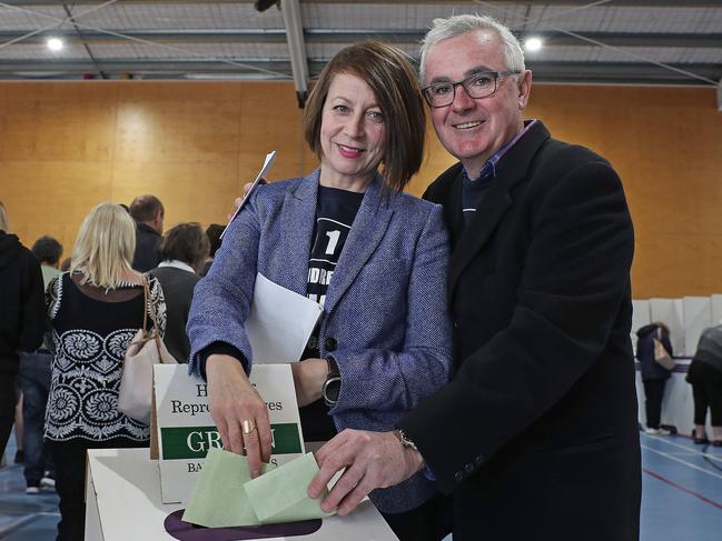 Independent member for Clark, Andrew Wilkie with fiance Dr Clare Ballingall voting at the polling booth at Glenorchy Primary School. Picture: LUKE BOWDEN