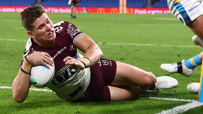 GOLD COAST, AUSTRALIA - JUNE 20: Reuben Garrick of the Sea Eagles scores a try during the round 15 NRL match between the Gold Coast Titans and the Manly Sea Eagles at Cbus Super Stadium, on June 20, 2021, in Gold Coast, Australia. (Photo by Chris Hyde/Getty Images)