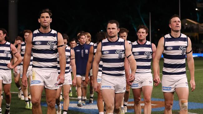 Patrick Dangerfield leads his team off the field before heading to hospital. Picture: Sarah Reed/AFL Photos via Getty Images