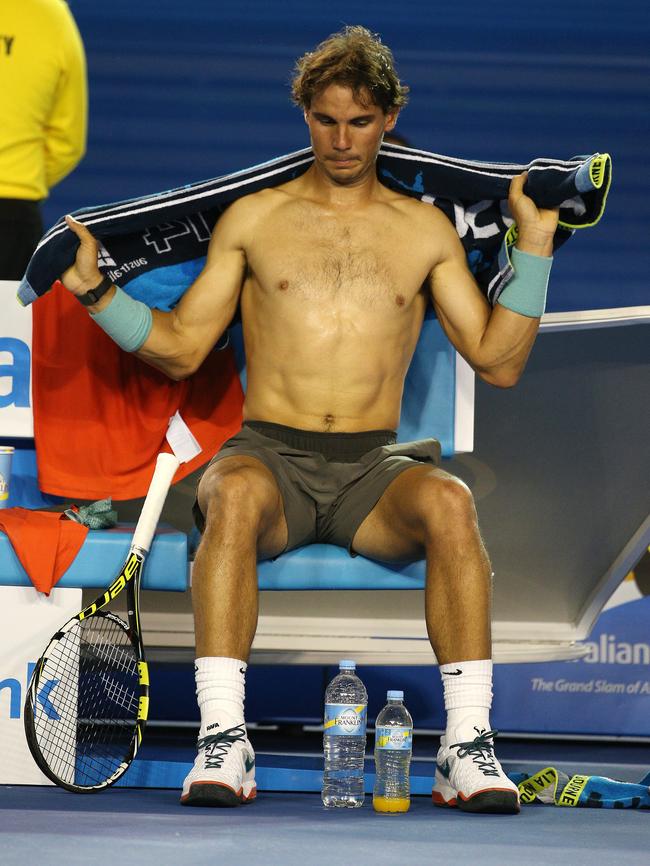 Rafael Nadal cools down during a game break.