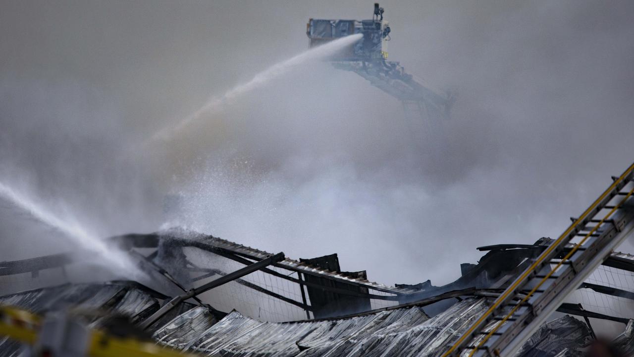 Firefighters tackle a blaze at a recycling factory in Campbellfield on Sunday. Picture: Sarah Matray