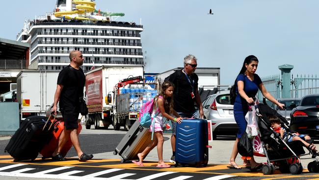 People disembark the Carnival Legend at Station Pier. Picture: Nicole Garmston