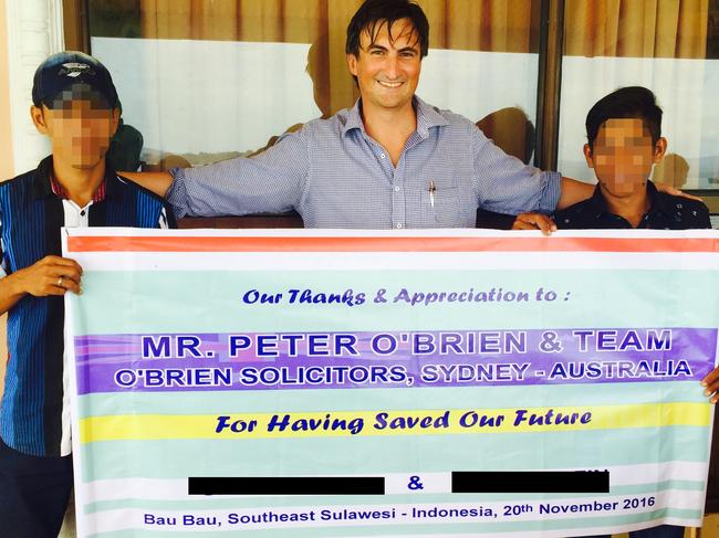 Solicitor Peter O'Brien and the two Indonesian boys who received compensation for unlawful arrest and false imprisonment.Picture: Supplied