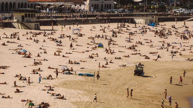 Crowds flocked to Bondi Beach this week as scorching temps hit. Picture: Dean Tirkot/news.com.au