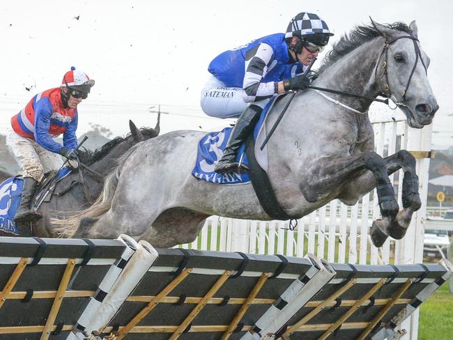 Saunter Boy (FR) ridden by Steven Pateman clears the jump on their way to winning  the cartergroup.com.au Kevin Lafferty Hurdle at Warrnambool Racecourse on July 04, 2021 in Warrnambool, Australia. (Reg Ryan/Racing Photos via Getty Images)