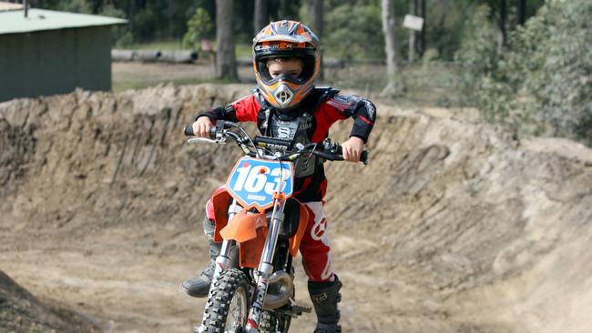 Hamish Turner on his 50cc dirt bike on track at Reedy Creek. A petition has been created to bring an adrenaline precinct to the Gold Coast. Picture: Geoff McLachlan.