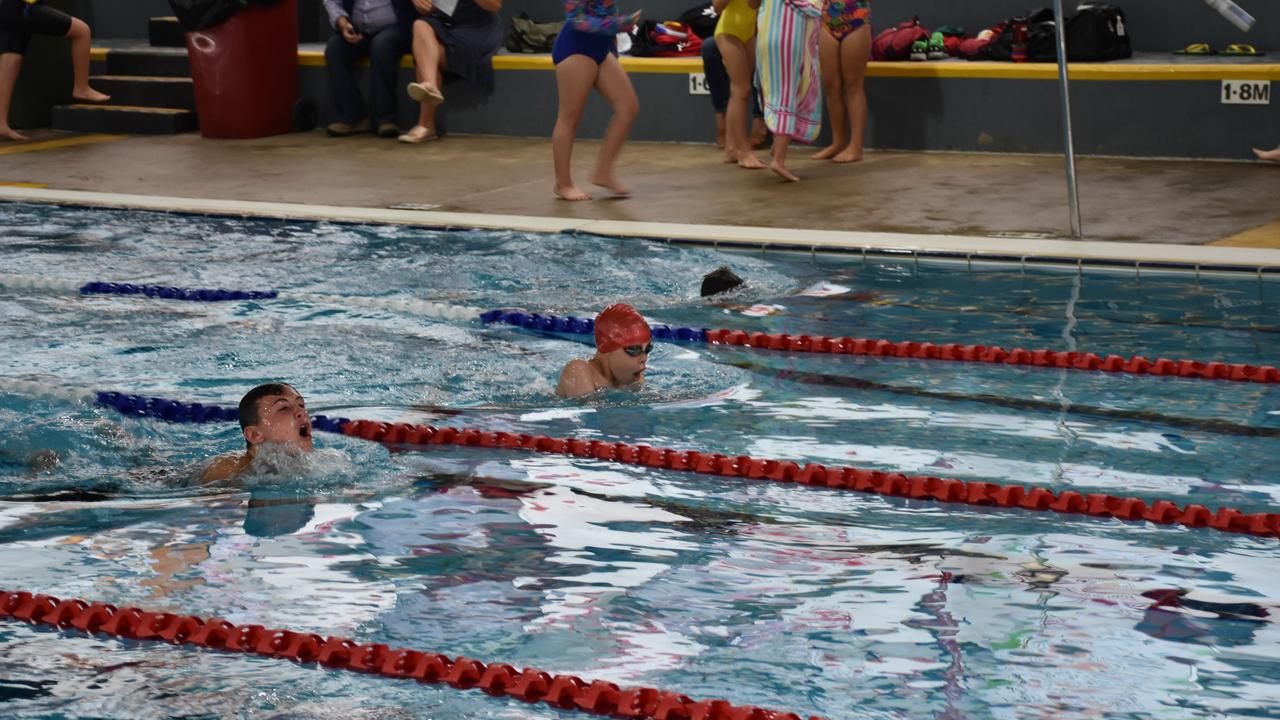 Heavy competition for second and third in the 12 yrs 50m breaststroke.